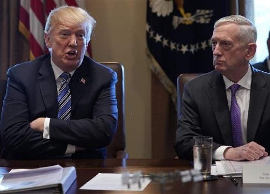 In this file photo taken on March 08, 2018, US President Donald Trump (L) speaks with Defense Secretary James Mattis during a cabinet meeting in the Cabinet Room of the White House in Washington, DC. (Photo by AFP)