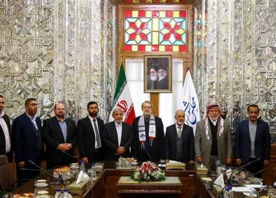Iranian Parliament Speaker Ali Larijani (4th-R) meets with a Palestinian parliamentary delegation, led by Mahmoud al-Zahar (5th-L), in Tehran on December 22, 2018. (Photo by ICANA)