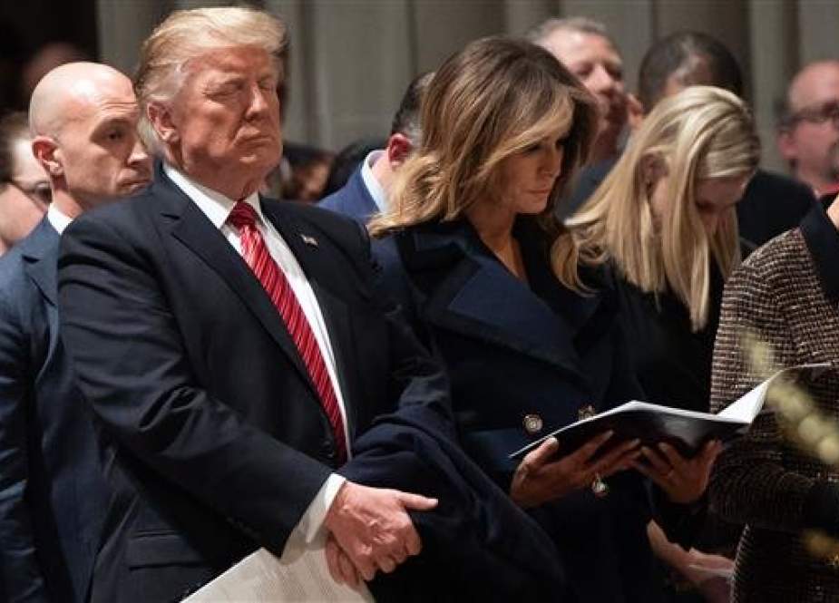 US President Donald Trump and First Lady Melania Trump attend a Christmas Eve service at Washington National Cathedral in Washington, DC, on December 24, 2018. (AFP photo)