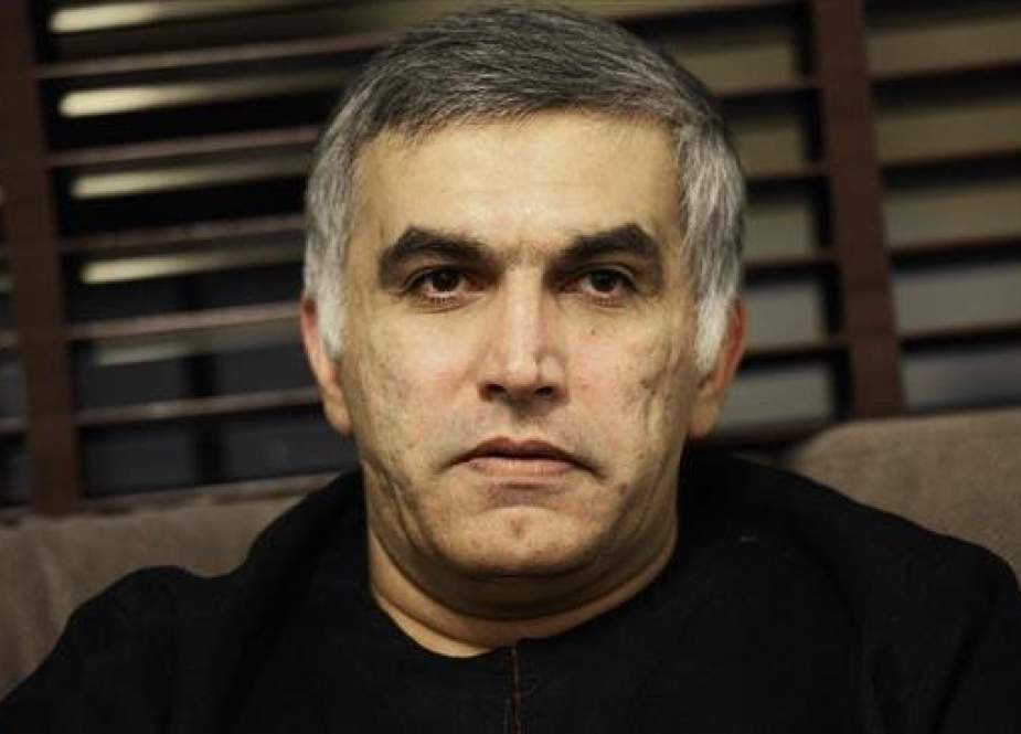 In this file photo taken on November 2, 2014, Bahraini human rights activist Nabeel Rajab sits at his home in the village of Bani Jamrah, West of Manama. (Photo by AFP)