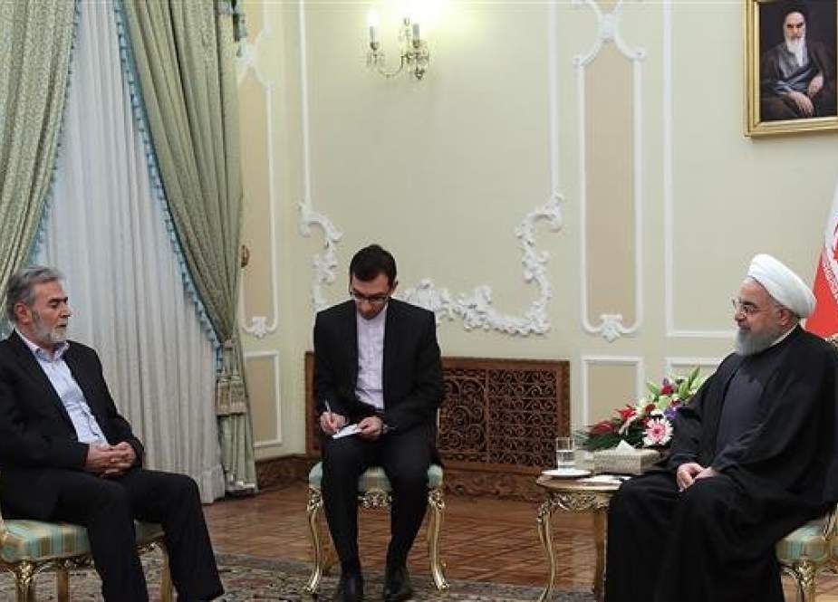 Iranian President Hassan Rouhani (R) meets with visiting Secretary General of the Palestinian Islamic Jihad resistance movement, Ziad al-Nakhala, in Tehran, Iran, on January 1, 2019. (Photo by President.ir)
