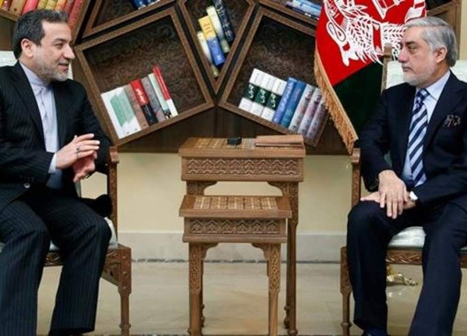 Iranian Deputy Foreign Minister for Political Affairs Abbas Araqchi (L) and Afghanistan