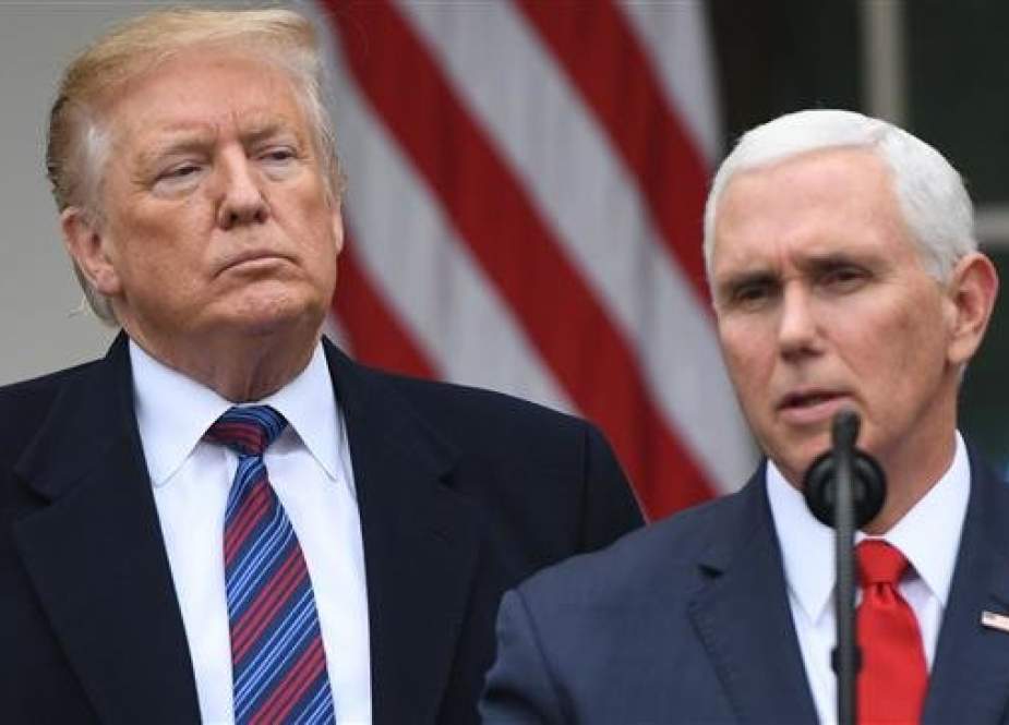 US President Donald Trump listens as Vice President Mike Pence speaks at a press conference in the Rose Garden of the White House in Washington, DC, on January 4, 2019. (Photo by AFP)