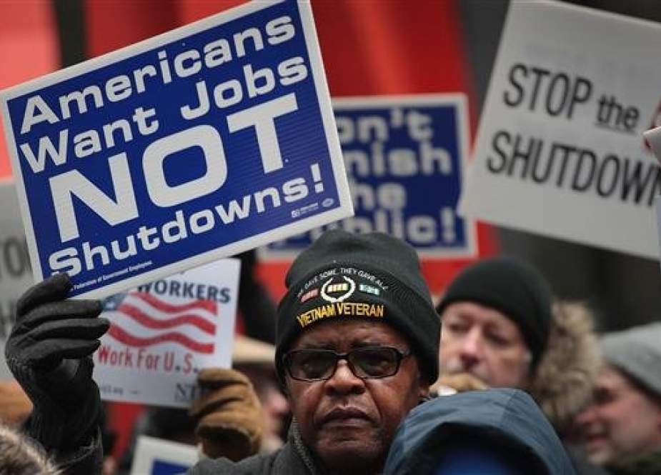 US government workers protest the government shutdown during a demonstration in the Federal Building Plaza on January 10, 2019 in Chicago, Illinois. (Getty Images)