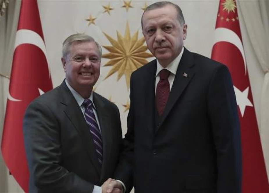 US Republican Senator Lindsey Graham (L) shake hands with Turkish President Recep Tayyip Erdogan, before a meeting in the capital Ankara, January 18, 2019. (Photo by AP)