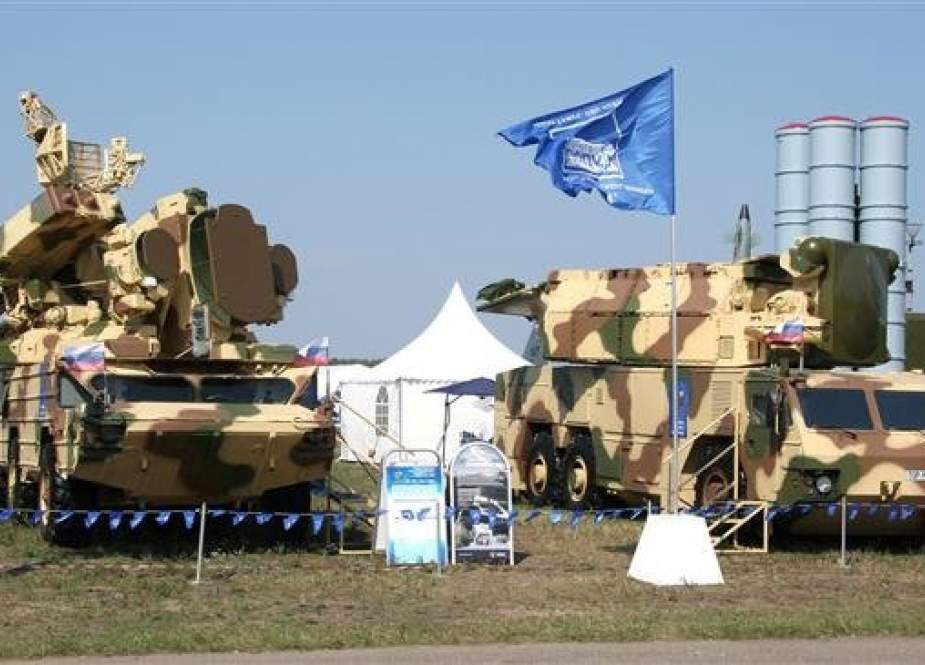 This file photo shows Russian Tor-M2 (L) and Osa-AKM air defense systems on display.