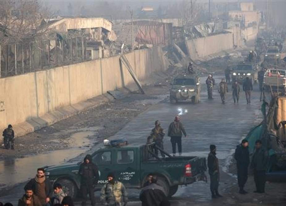 Afghan security forces gather at the site of a truck bomb attack near a foreign compound in the capital, Kabul, on January 15, 2019. (Photo by AFP)