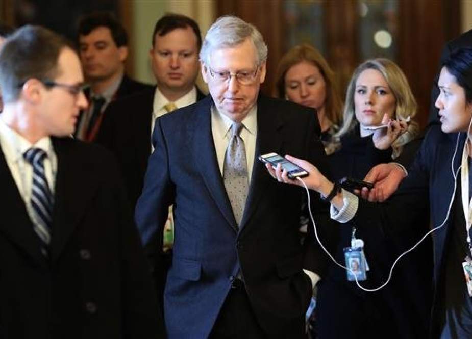 Senate Majority Leader Mitch McConnell (R_KY) is trailed by reporters after speaking on the floor of the US Senate on January 22, 2019 in Washington, DC. (Photo by AFP)