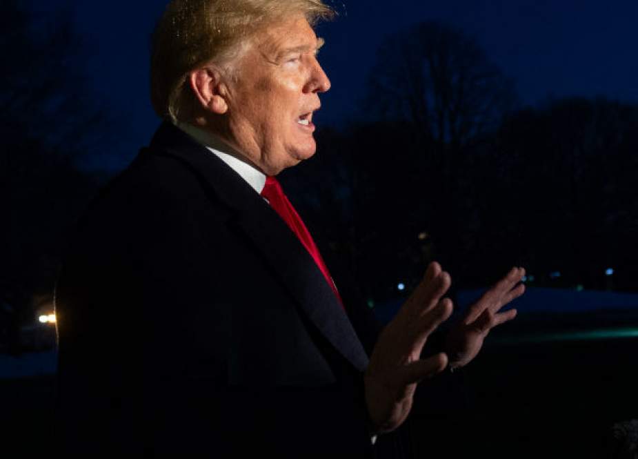 US President Donald Trump speaks to the media after arriving on Marine One on the South Lawn of the White House in Washington, DC, January 14, 2019. (Photo by AFP)