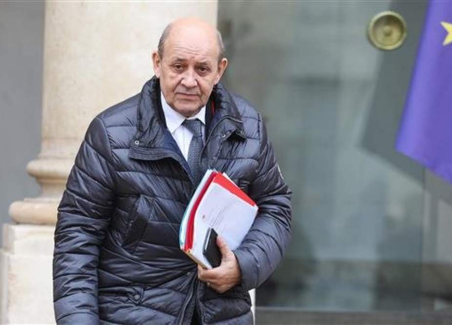 Jean-Yves Le Drian, French Foreign Minister leaves the Elysee Presidential Palace.jpg