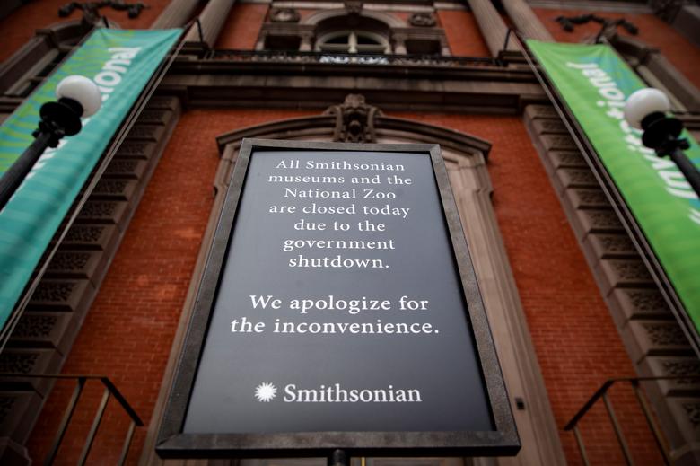 A sign outside of the Renwick Gallery stating that all Smithsonian museums are closed is seen on day 30 of the shutdown, in Washington, January 20.
