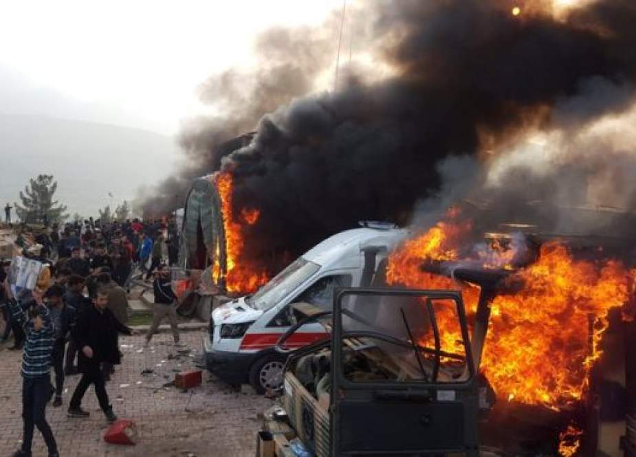 File photo shows military vehicle set on fire during clashes between Kurdish protesters and Turkish troops in a Turkish military camp near Dohuk in Iraq’s semi-autonomous Kurdish region on January 27, 2019.