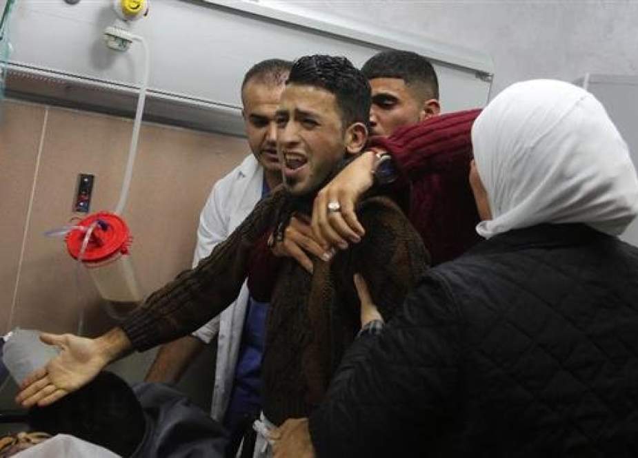 The relatives of a Palestinian man — who was killed by Israeli settlers — react after identifying his body at a hospital in Ramallah, in the Israeli-occupied West Bank, on January 26, 2019. (Photo by AFP)