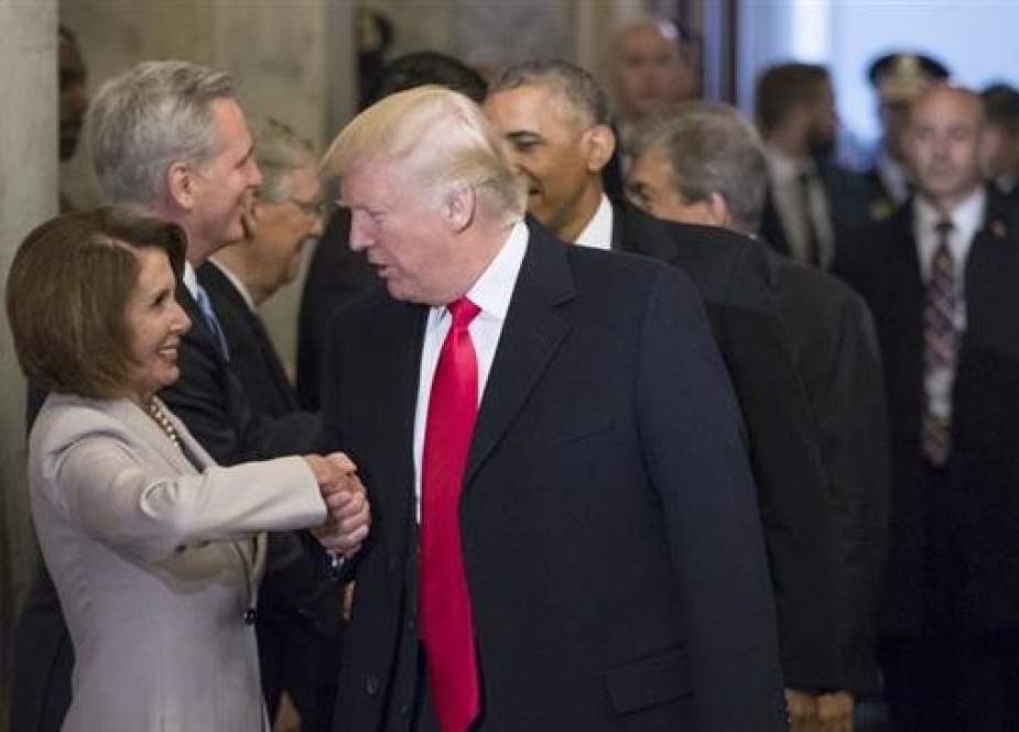 Then President-elect Donald Trump greets then House Minority Leader Nancy Pelosi of California and other congressional leaders as he arrives for his inauguration ceremony on Capitol Hill in Washington, on January 20, 2017. (Photo by AP)