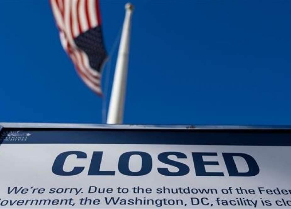 In this file photo taken on December 22, 2018 a sign is displayed on a government building that is closed because of a US government shutdown, in Washington, DC. (Photo by AFP)
