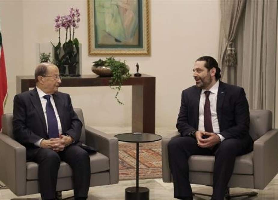 Lebanese President Michel Aoun (L) and Prime Minister Saad Hariri meet at the presidential palace in Baabda, east of Beirut, on January 31, 2019. (Photo by AFP