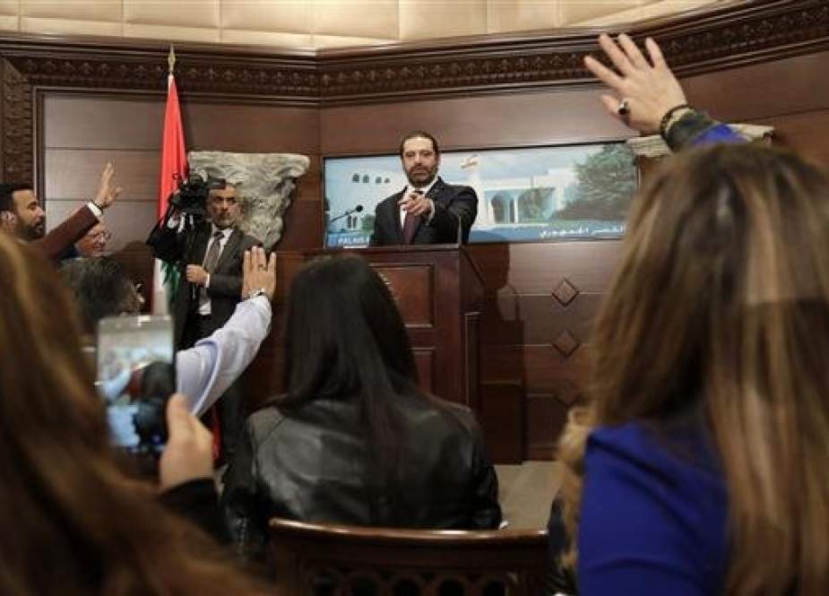Lebanese Prime Minister Saad Hariri (C) addresses the media after announcing the new cabinet during a press conference at the presidential palace in Baabda, east of the capital Beirut, on January 31, 2019. (Photo by AFP)
