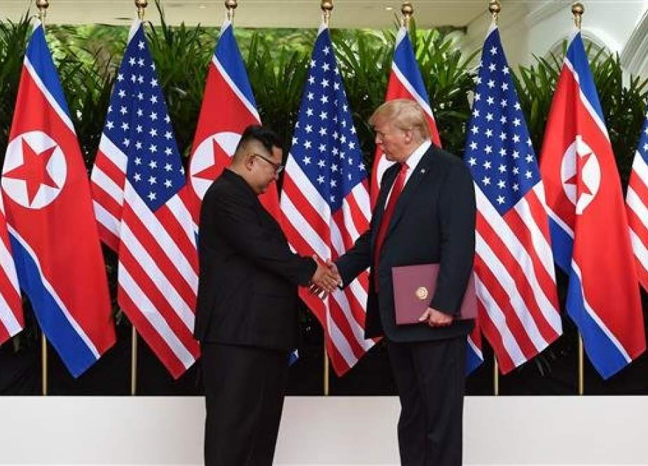 US President Donald Trump meeting North Korean Leader Kim Jung UN last June. (Photo by AFP)