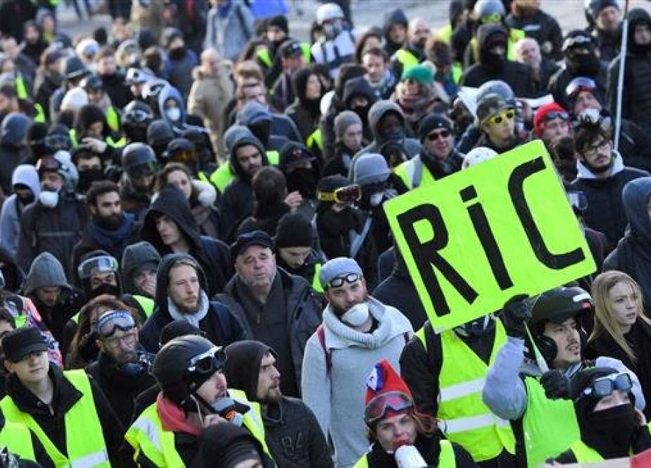Protesters take part in a demonstration called by the "Yellow Vests" (Gilets Jaunes) movement in Nantes, western France, on February 2, 2019. (AFP)