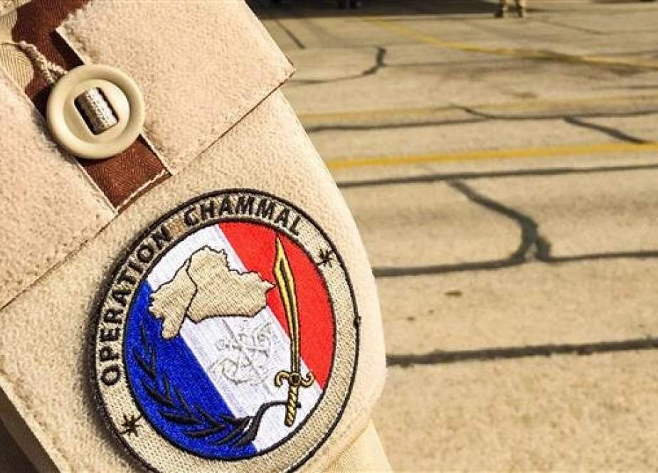 This picture taken on January 1, 2019 shows a badge on a French airman’s arm signifying "Operation Chammal", as part of the French air force