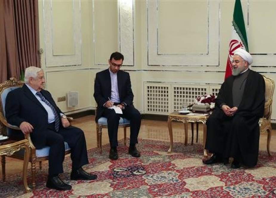 Iranian President Hassan Rouhani (R) meets with Syrian Foreign Minister Walid al-Muallem in Tehran on February 6, 2019. (Photo by president.ir)