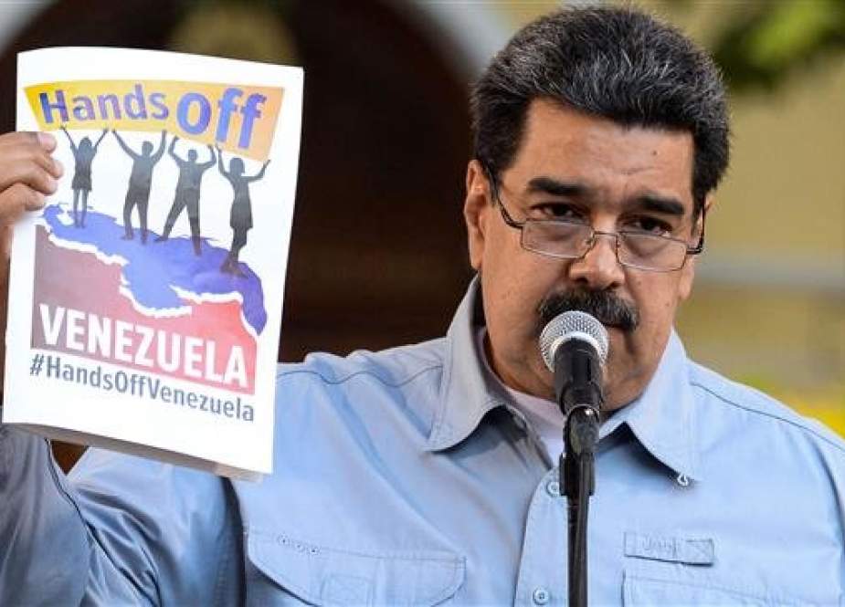 Venezuelan President Nicolas Maduro delivers a speech on the signature campaign launched to urge the United States to put an end to intervention threats against his government, at Bolivar square in the capital city of Caracas, on February 7, 2019. (Photo by AFP)