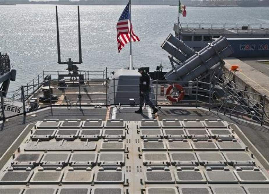 A US marine serviceman stands by missile launch pads on the deck of the USS Vicksburg in the Black Sea port of Constanta, Romania, March 15, 2015. (Photo by AP)