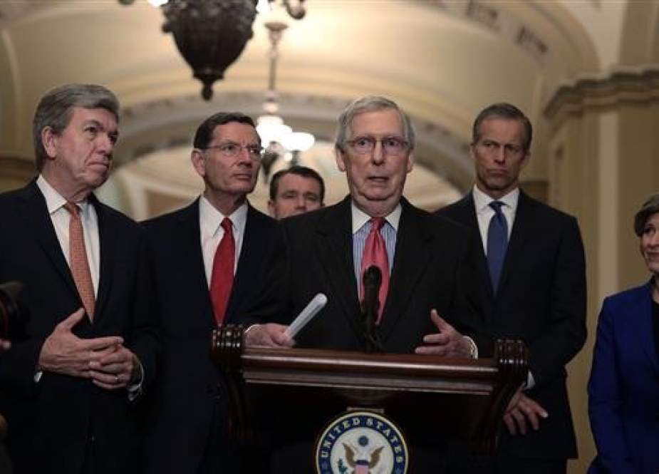 US Senate Majority Leader Sen. Mitch McConnell (R-KY) (C) speaks to members of the media as (L-R) Sen. Roy Blunt (R-MO), Sen. John Barrasso (R-WY), Sen. Todd Young (R-IN), Senate Majority Whip Sen. John Thune (R-SD) and Sen. Joni Ernst (R-IA) listen after a weekly Senate Republican Policy Luncheon at the U.S. Capitol February 5, 2019 in Washington, DC. (Photo by AFP)