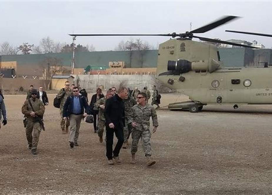 Acting Pentagon chief Patrick Shanahan (front 2nd R) arrives in Kabul, Afghanistan, on February 11, 2019, on a surprise visit. (Photo by AFP)