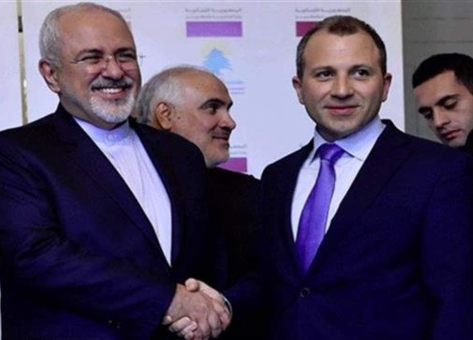 Iranian Foreign Minister Mohammad Javad Zarif (L) shakes hands with his Lebanese counterpart Gebran Bassil in Beirut on February 11, 2019.