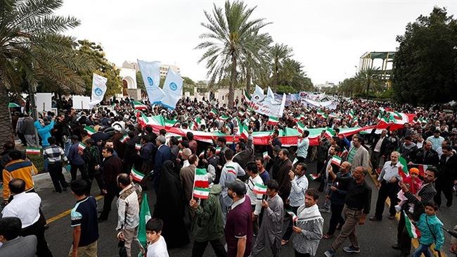 Iranians on the southern island of Kish mark the anniversary of the Islamic Revolution, February 11, 2019.