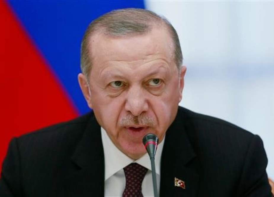 A handout picture taken and released on February 14, 2019 by the Turkish Presidential Press service shows Turkish President Recep Tayyip Erdogan speaking during a trilateral meeting on Syria in the Black Sea resort of Sochi. (Photo by AFP)
