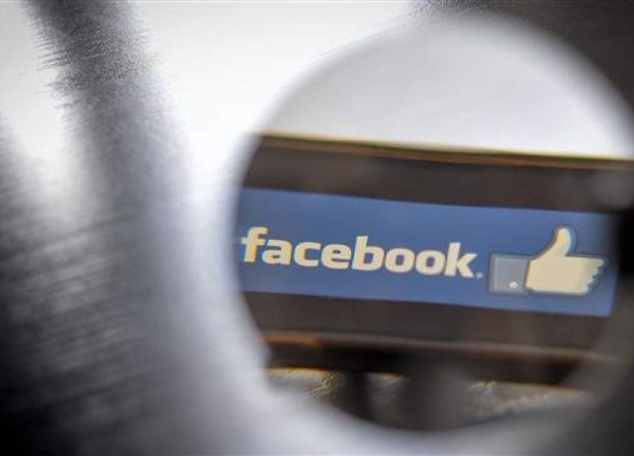 File photo shows the logo of social network Facebook on a smartphone