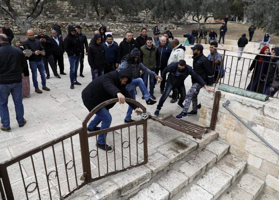 Palestinian demonstrators at the Al-Aqsa mosque compound in Jerusalem