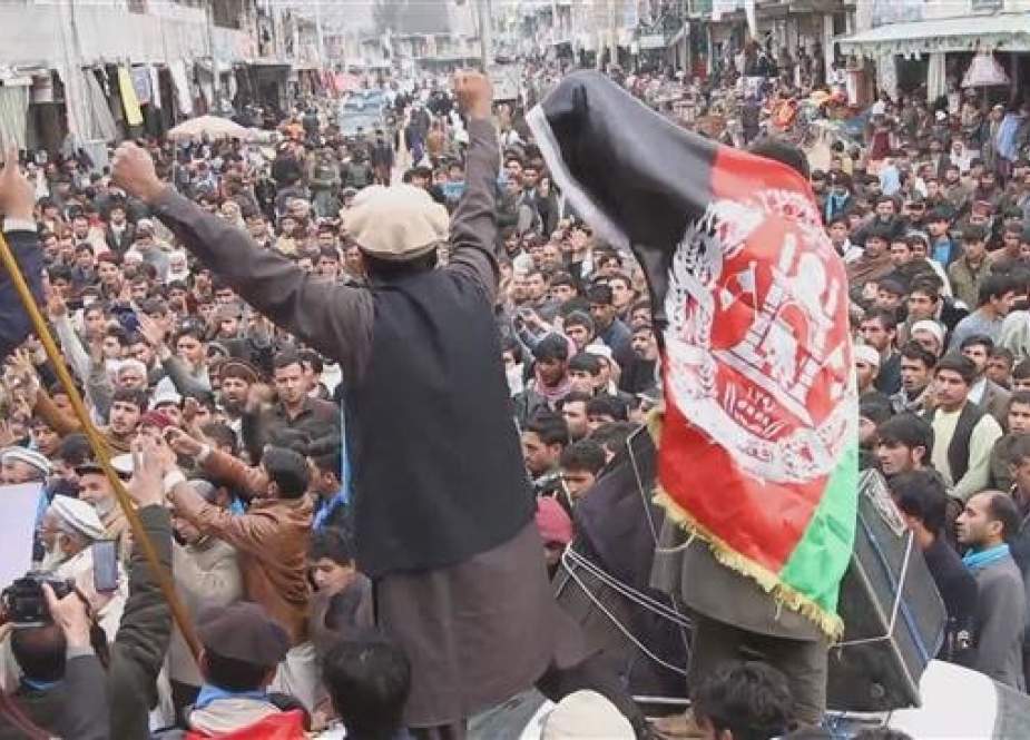 Hundreds of Afghans protest against US demanding an end to the airstrikes on civilians. in the eastern Kunar province of Afghanistan on Tuesday.