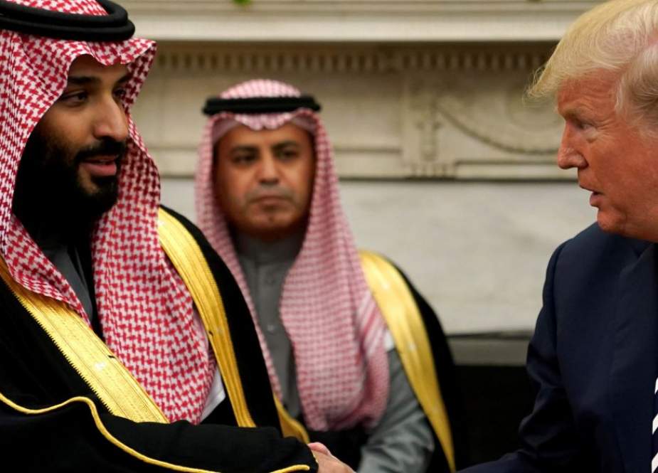 US President Donald Trump (R) shakes hands with Saudi Arabia