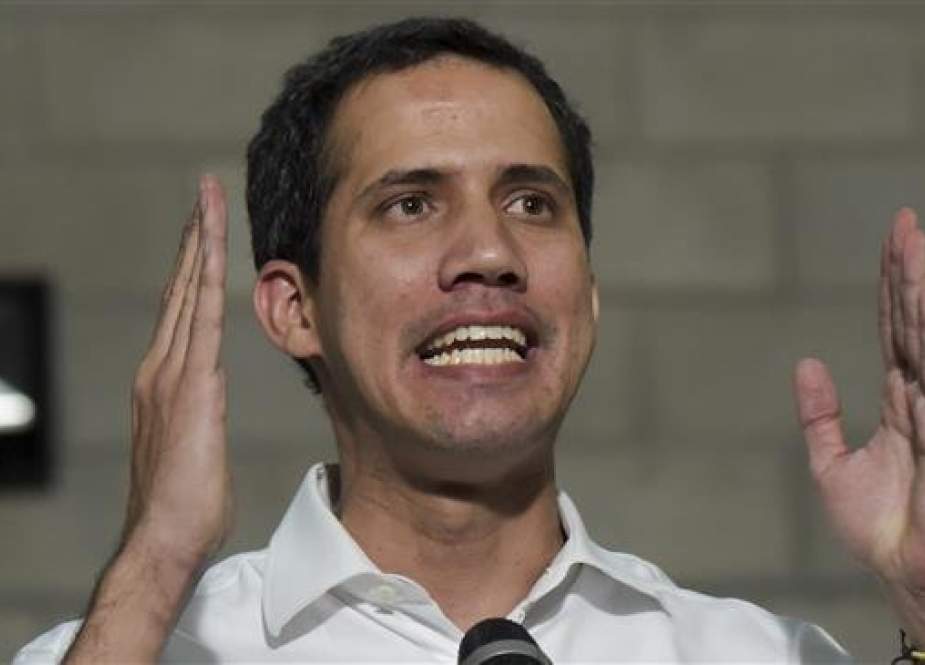 Venezuelan opposition leader Juan Guaido speaks during a press conference in a warehouse at the Tienditas International Bridge in Cucuta, Colombia, on February 23, 2019. (Photo by AFP)
