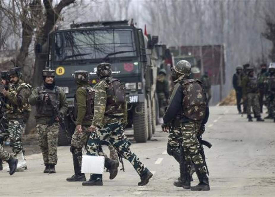 Indian security forces personnel are seen on maneuvers in South Kashmir’s Pulwama district, on February 18, 2019. (Photo by AFP)
