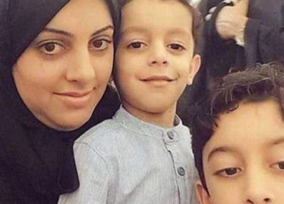 The undated photo shows Zainab Makki and her children.
