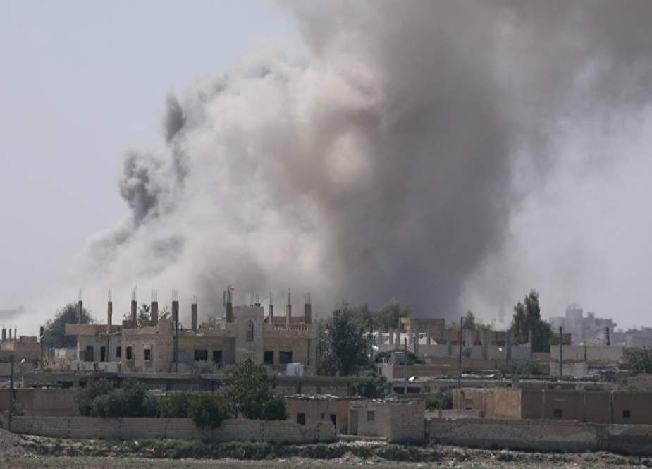 This file photo shows a Syrian town as being hit by white phosphorus bombs dropped by the US-led military coalition.