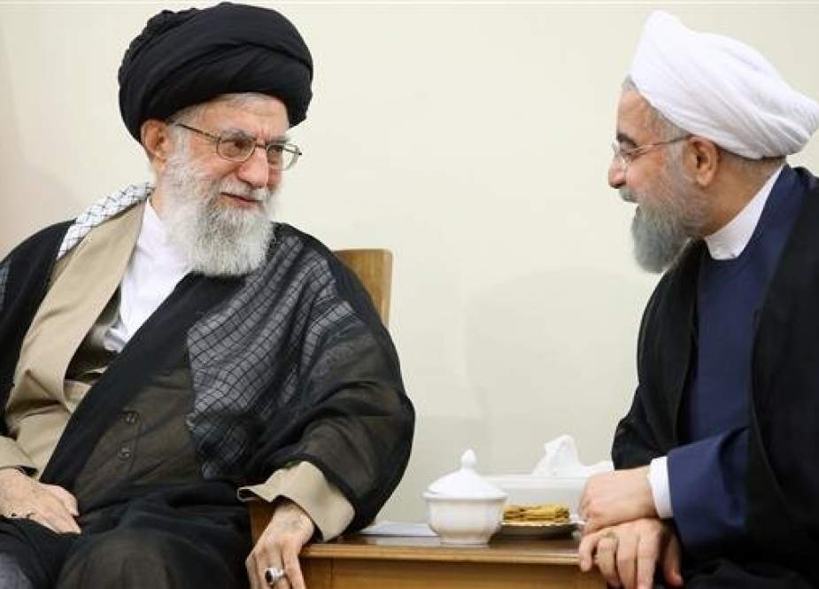 Leader of the Islamic Revolution Ayatollah Khamenei (L) talks to President Hassan Rouhani during a meeting in Tehran. (Photo by Leader.ir)