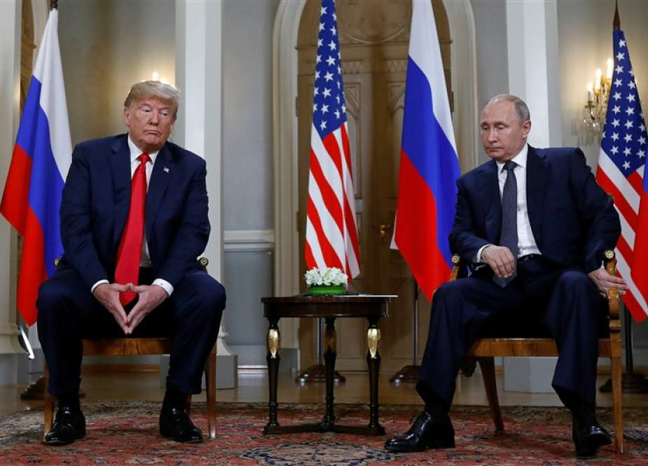 In this AFP file photo taken on July 16, 2018 Russian President Vladimir Putin (R) and US President Donald Trump attend a meeting in Helsinki, on July 16, 2018.