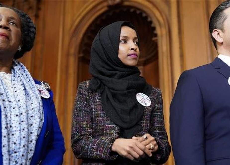File photo showing US Congresswoman Ilhan Omar (c) in Capitol Hill, Washington DC, on February 26, 2019. (Photo by AFP)