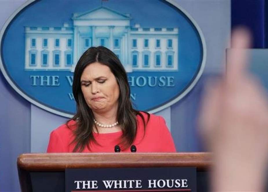 TOPSHOT - White House Press Secretary Sarah Sanders looks on during a briefing in the Brady Briefing Room of the White House in Washington, DC on January 28, 2019. (Photo by AFP)