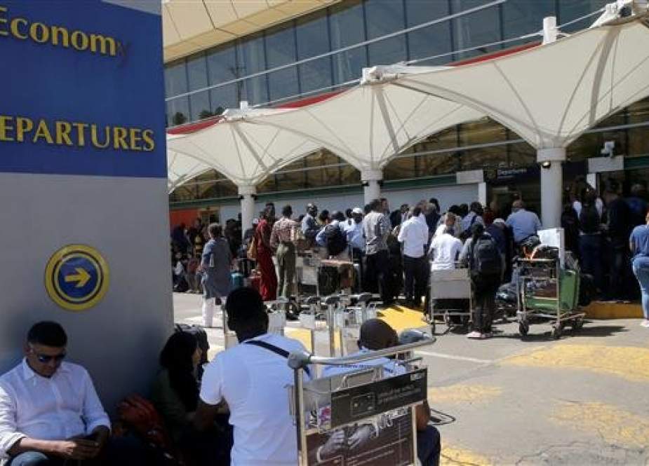 Passengers gather to be screened for check-in at Jomo Kenyatta International Airport, during a strike that has grounded flights, on the outskirts of Nairobi, Kenya, on March 6, 2019. (Photo by Reuters)
