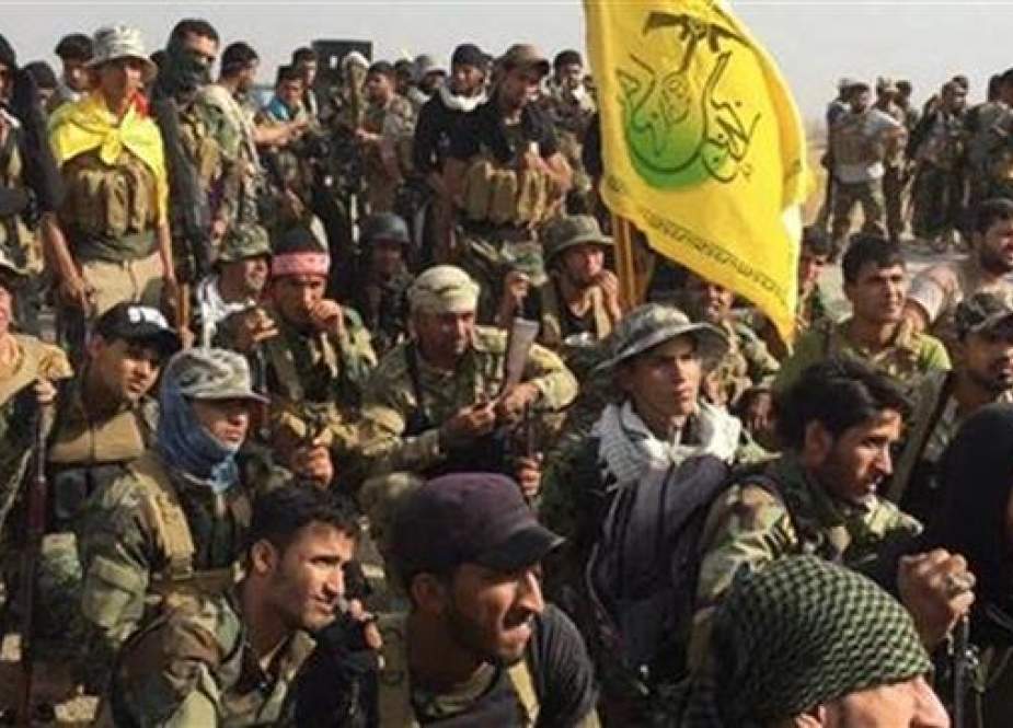 Members of Harakat Hezbollah al-Nujaba, an Iraqi pro-government Shia group.jpg