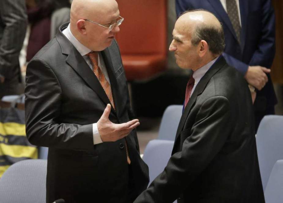 US diplomat Elliott Abrams (R) speaks to Russian Ambassador to the United Nations Vasily Nebenzya at the United Nations Security Council meeting on controlling the turmoil in Venezuela on February 28, 2019 at the United Nations in New York.