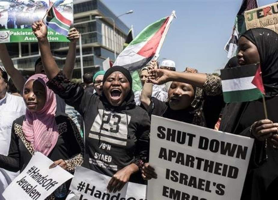 Pro-Palestine demonstrators chnat slogans outside the US Consulate General in Sandton, Johannesburg, South Africa, December 14, 2017.