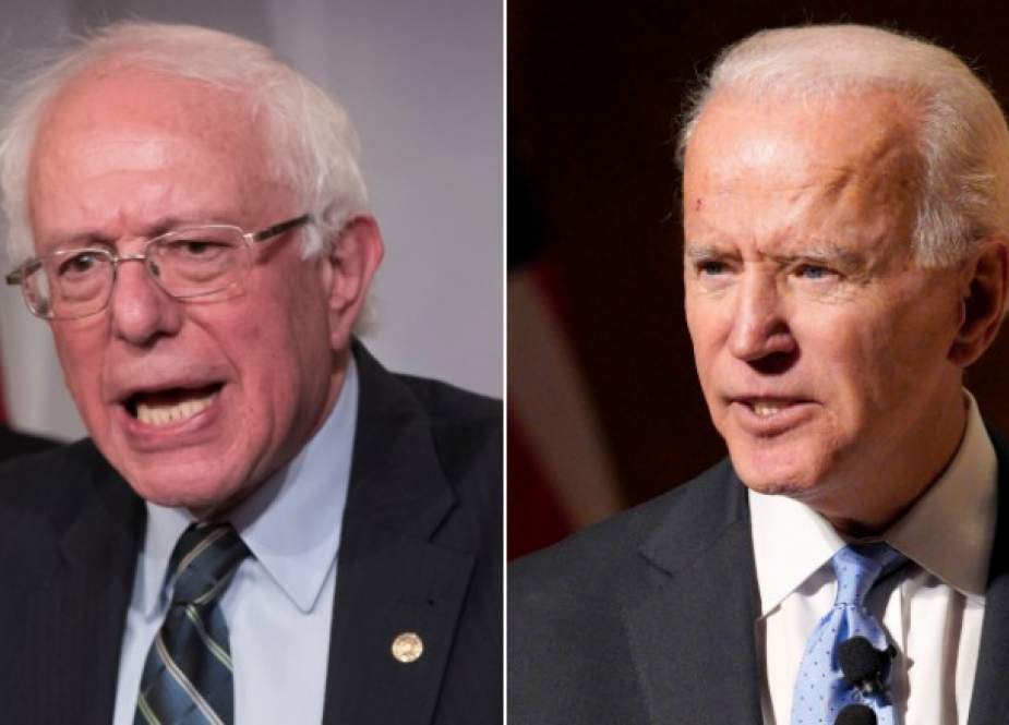 Former US Vice President Joe Biden (R) and Sen. Bernie Sanders