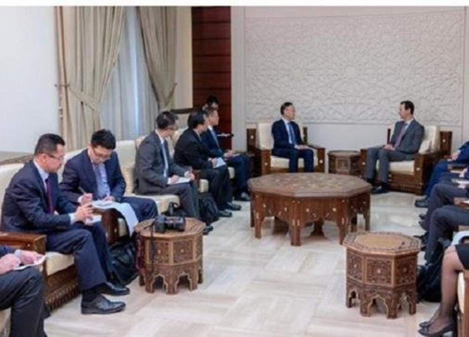 Syrian President Bashar al-Assad (C-R) meets with a visiting Chinese delegation in Damascus, Syria, on March 10, 2019. (Photo by SANA)